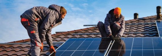 solar-panels-and-installers-on-roof